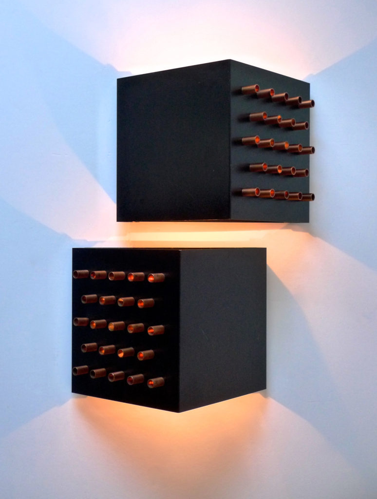 A fabulous pair of "Clair-Obscur" (model C-1516) wall lights / sconces by Dutch lighting creator RAAK Amsterdam, dating from the 1960s.