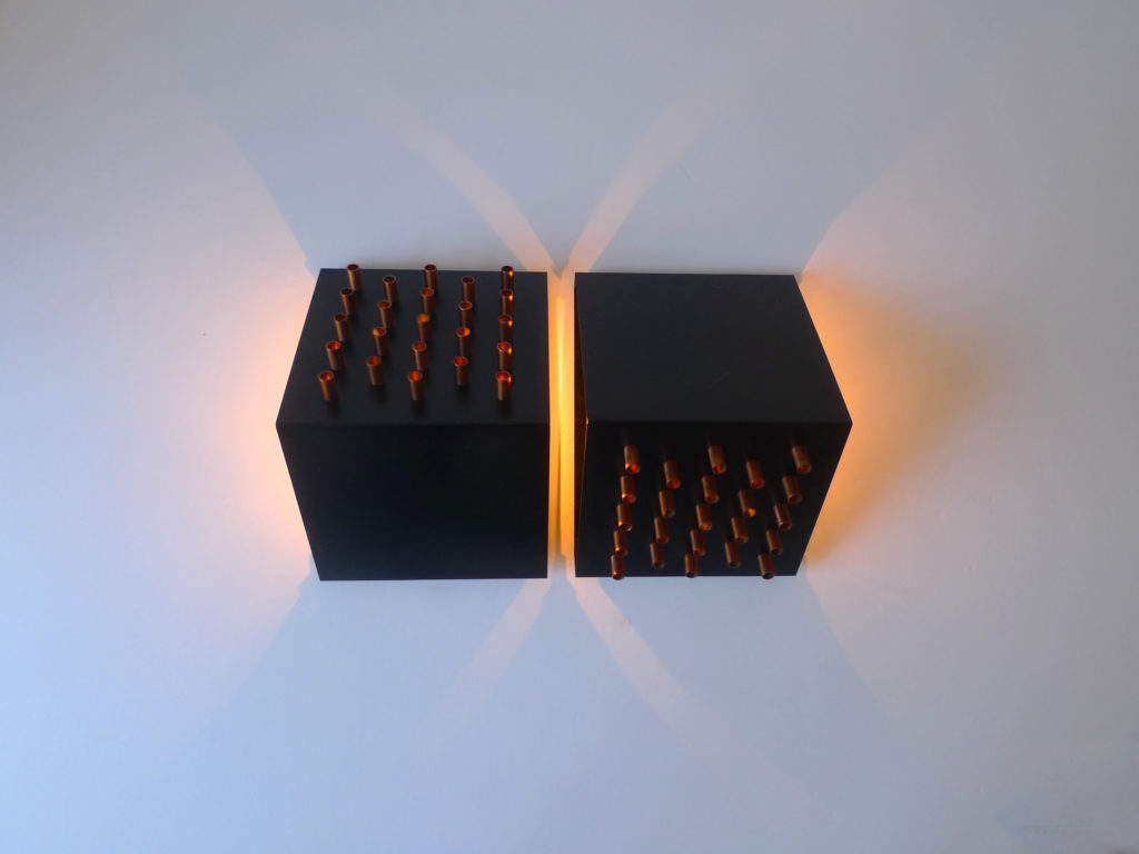 A fabulous pair of "Clair-Obscur" (model C-1516) wall lights / sconces by Dutch lighting creator RAAK Amsterdam, dating from the 1960s.
