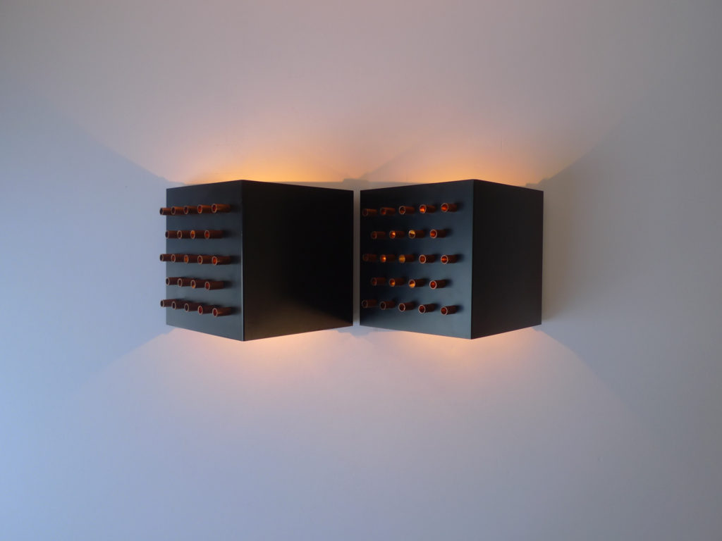 A fabulous pair of "Clair-Obscur" (model C-1516) wall lights / sconces by Dutch lighting creator RAAK Amsterdam, dating from the 1960s.