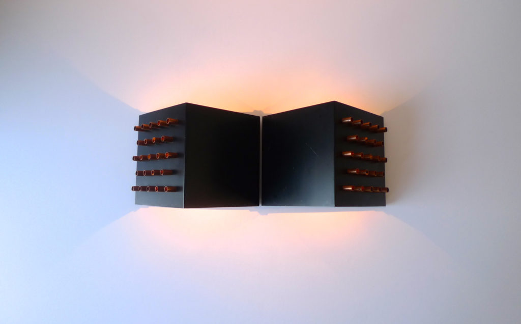 A fabulous pair of "Clair-Obscur" (model C-1516) wall lights / sconces by Dutch lighting creator RAAK Amsterdam, dating from the 1960s.